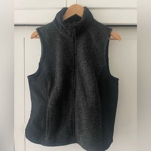 Sweater vest, black and dark grey. Size large. Tags still on! Never been worn.